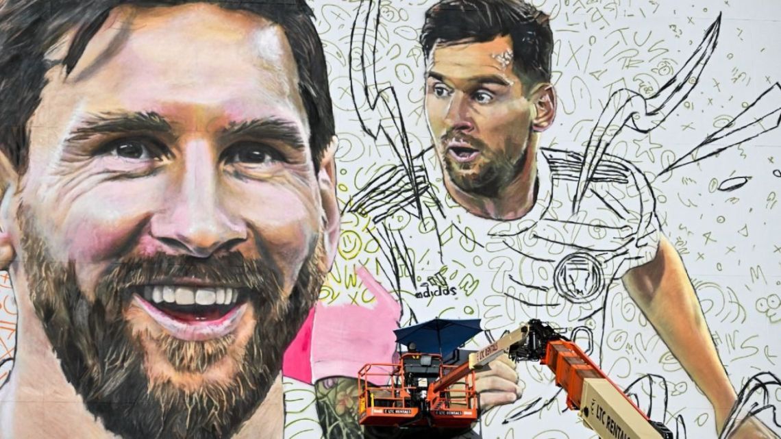 Argentine artist Maximiliano Bagnasco paints a giant mural of international soccer star Lionel Messi in Wynwood, Miami’s art district, in Miami, Florida on July 10, 2023. 