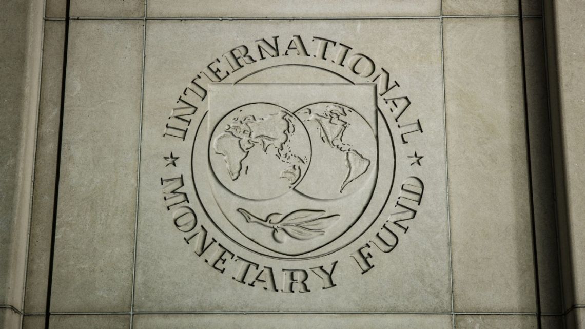 The International Monetary Fund's logo is pictured at its headquarters in Washington, DC.