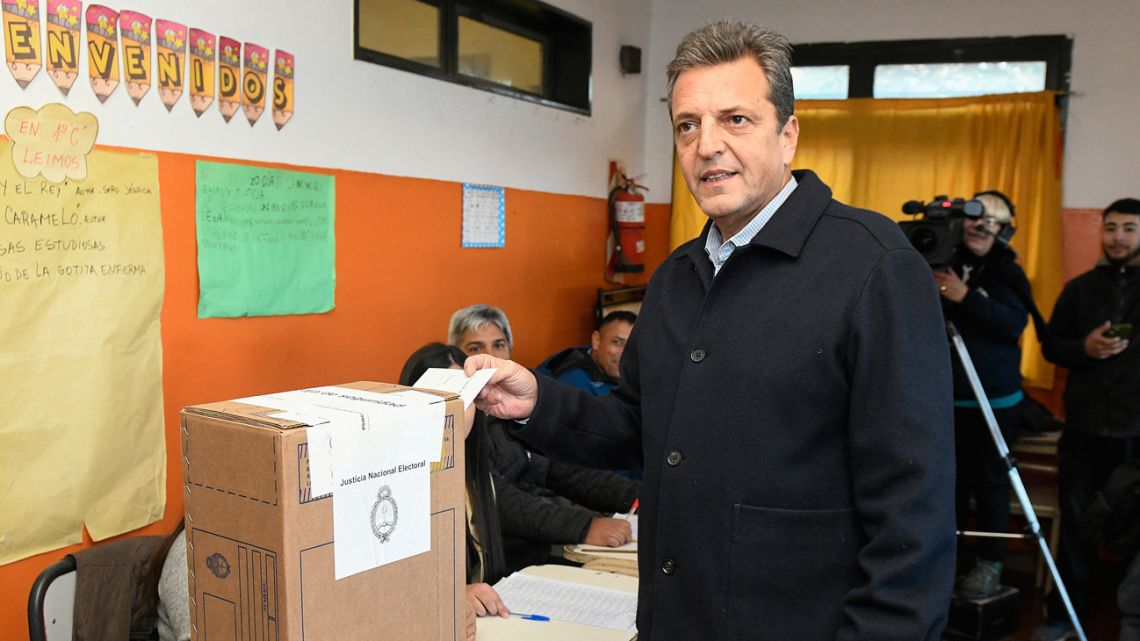 Presidential hopeful for the ruling Unión por la Patria coalition, Economy Minister Sergio Massa, poses as he casts his vote during primary elections at a polling station in Tigre on August 13, 2023.