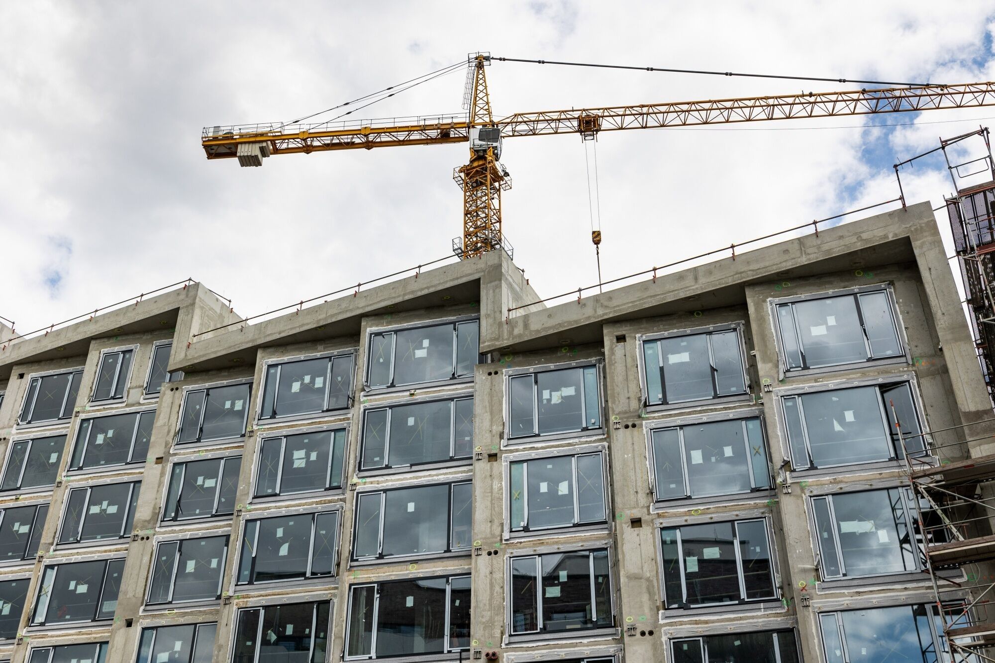 German Housing Push Falters as Building Permits Slump by a Third