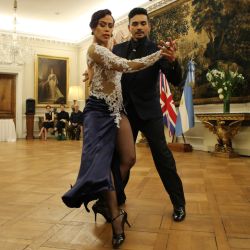 Tango dancers show off their fancy footwork at the British Ambassador's Residence in Buenos Aires.