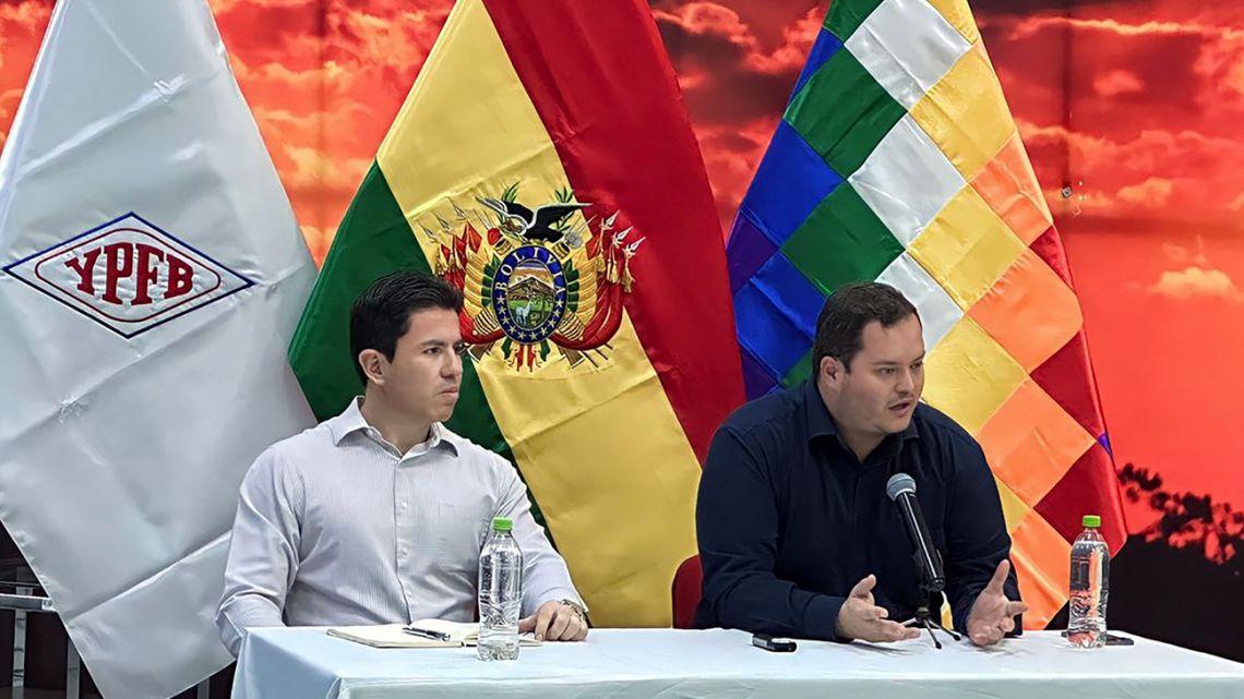 Handout picture released by Yacimiento Petroliferos Fiscales Bolivianos (YPFB) showing YPFB President Armin Dorgathen (right) and the Bolivian state-owned company's commercial manager, Oscar Claros, offering a press conference in Santa Cruz, Bolivia, on August 30, 2023. 