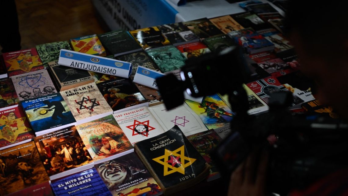 Argentine police seized more than 200 Nazi-oriented publications and book covers from an irregular printing press set up in a house in a Buenos Aires suburb and arrested its owner, authorities said Wednesday. 