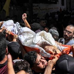El cuerpo del manifestante palestino Mohammed Qadom, que murió durante una explosión en una protesta cerca de la valla fronteriza con Israel. Foto de Mohammed ABED / AFP | Foto:AFP