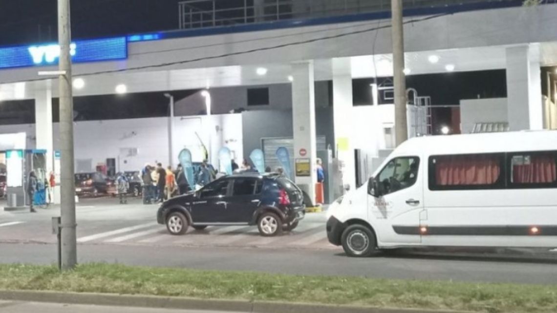 Two moped muggers shot at students at a petrol station.