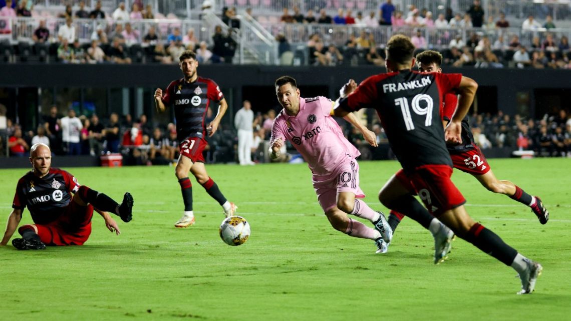 Inter Miami's Argentine forward #10 Lionel Messi runs with the ball during the Major League Soccer (MLS) football match between Inter Miami CF and Toronto FC at DRV PNK Stadium in Fort Lauderdale, Florida, on September 20, 2023. 