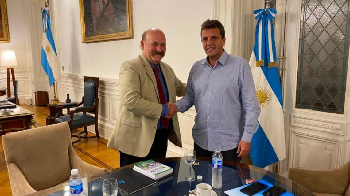 Carlos María De los Santos and Sergio Massa.