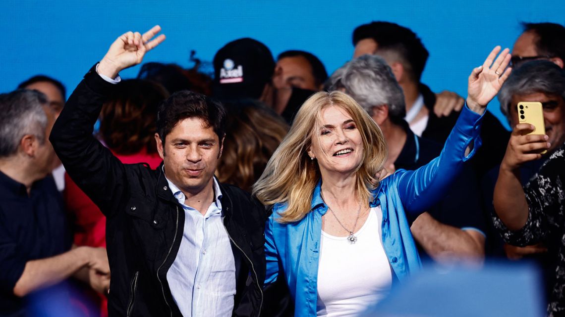 Buenos Aires Province Governor Axel Kicillof and deputy governor Verónica Magario celebrate with supporters after learning the first results of the presidential election at the Unión por la Patria coalition bunker in Buenos Aires on October 22, 2023. 