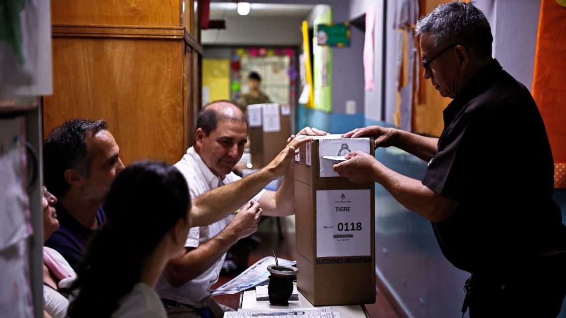 A man casts his vote at the polling station in Tigre, on the outskirts of northern Buenos Aires, during the presidential election on October 22, 2023.