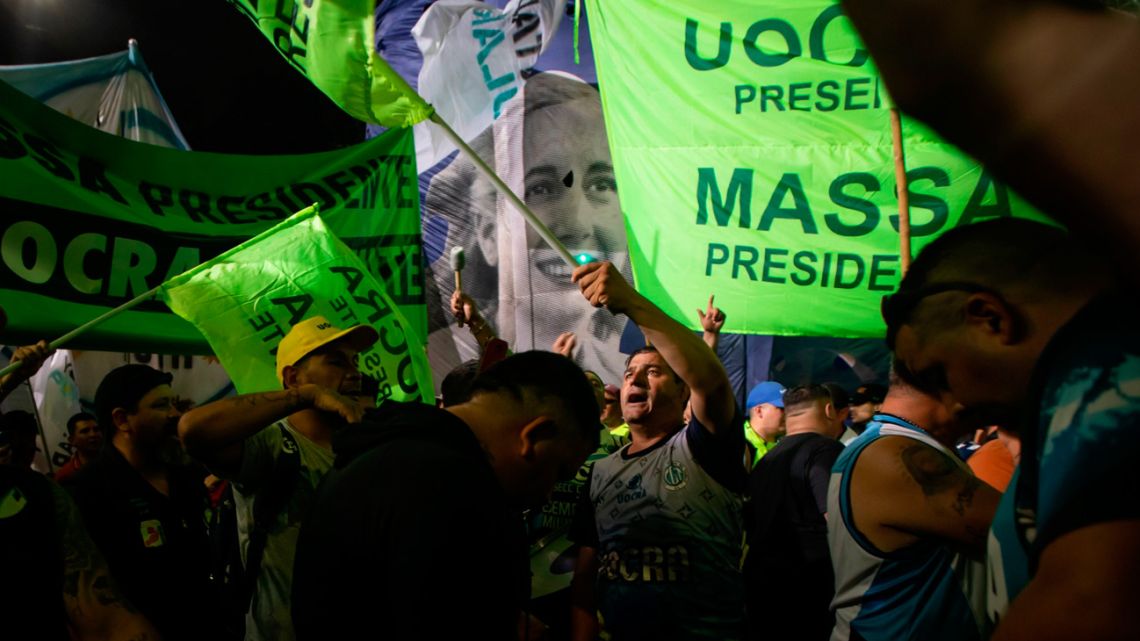 Peronist voters celebrate during an election night rally in Buenos Aires. 