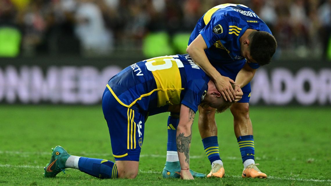 Boca Juniors' defender Nicolas Valentini (L) and Boca Juniors' midfielder Vicente Taborda react after losing the Copa Libertadores final football match between Brazil's Fluminense and Argentina's Boca Juniors at Maracana Stadium in Rio de Janeiro, Brazil, on November 4, 2023. 