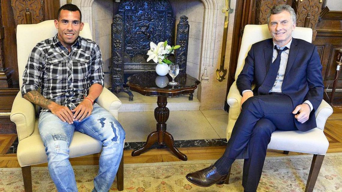 Carlos Tevez, pictured with then-president Mauricio Macri, at the Casa Rosada.
