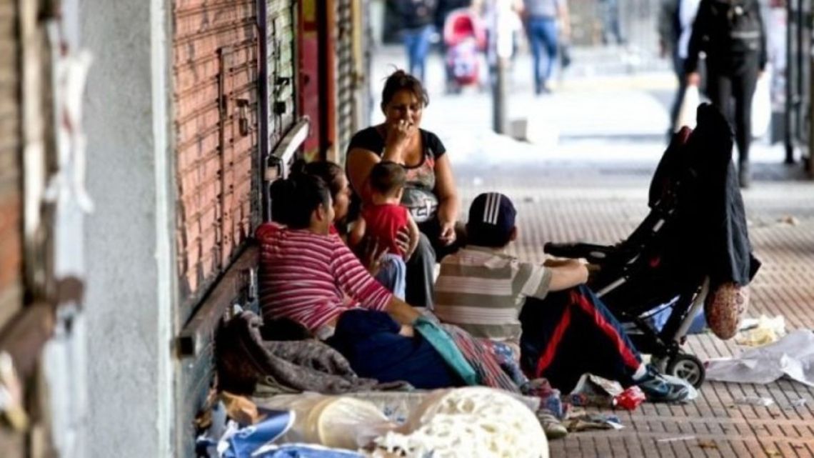 A homeless family, pictured on the streets of Buenos Aires.