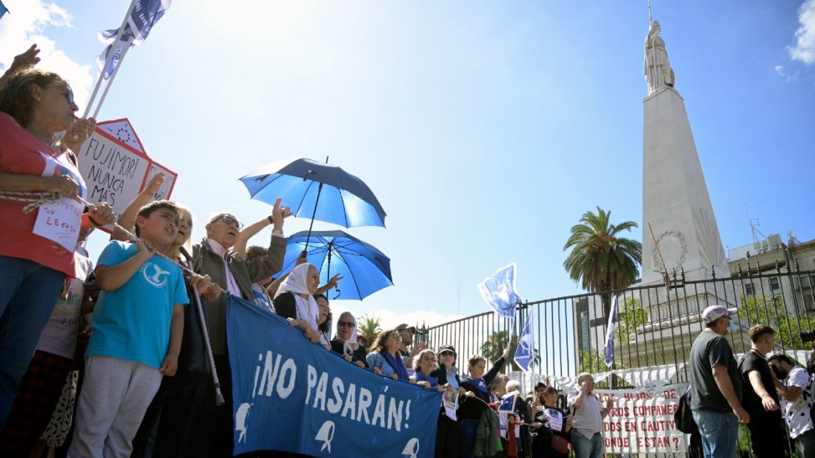Members of the Madres de Plaza de Mayo human rights organisation take part in the '43rd Resistance March' at the Plaza de Mayo Square in Buenos Aires on December 7, 2023, to pay homage to the victims of Argentina's 1976–1983 dictatorship. 