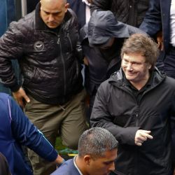 Argentina's President Javier Milei (2nd R) leaves after voting during the elections in Boca Juniors football club, at La Bombonera stadium, in Buenos Aires, Argentina, on December 17, 2023. 