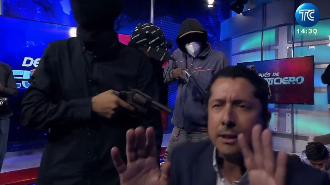 Armed men wearing balaclavas burst into the studio of a public television station on Tuesday in Ecuador's drug violence-torn port city of Guayaquil, taking hostage several journalists and staff members, live footage showed.