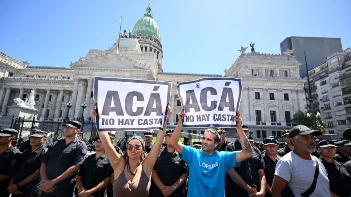 People take part in a demonstration outside Congress during a national strike against the government of Javier Milei in Buenos Aires, on January 24, 2024. 
