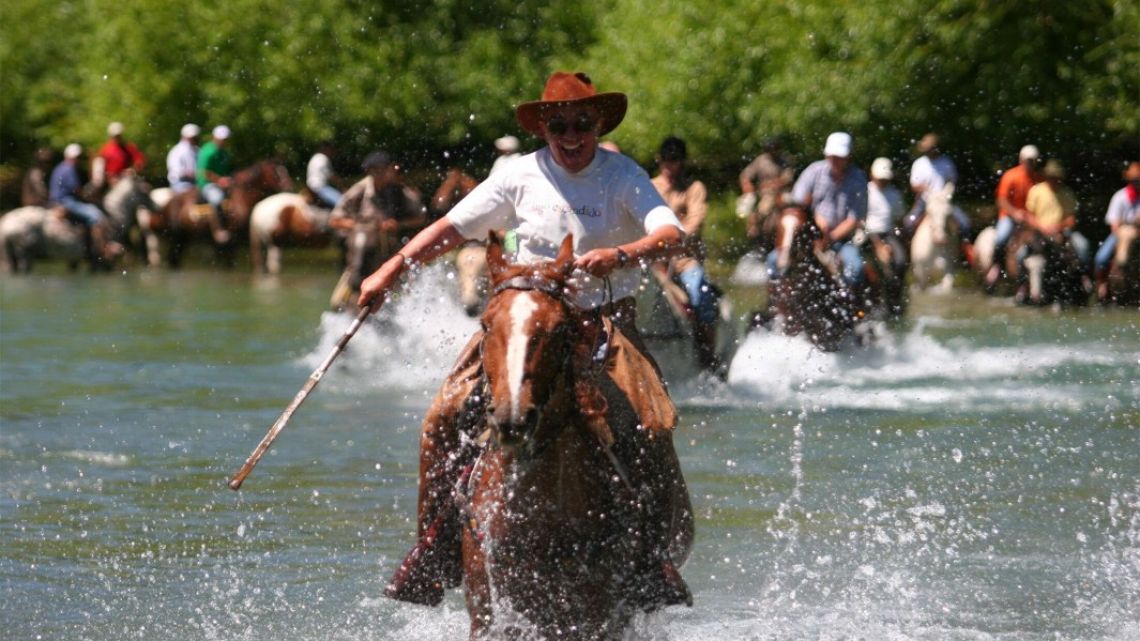 Joe Lewis horseback riding during an employee trip to his property in Argentina in 2006