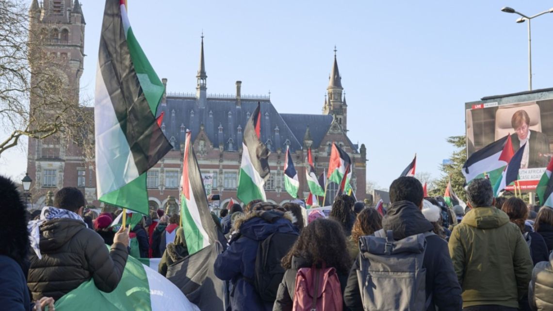 Protesters outside the International Court of Justice in The Hague, on Jan. 26