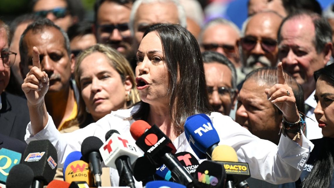 Venezuelan opposition leader, Maria Corina Machado, speaks during a press conference outside her party headquarters in Caracas on January 29, 2023.