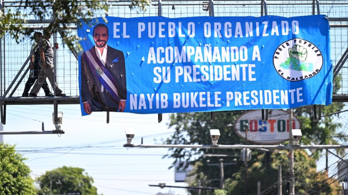 A banner in support of President Nayib Bukele is seen on a pedestrian bridge in San Salvador on February 1, 2024, ahead of Sunday's presidential and legislative elections