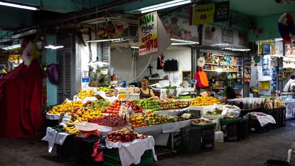 A vendor at La Vega Central fruit and vegetable market in Santiago, Chile