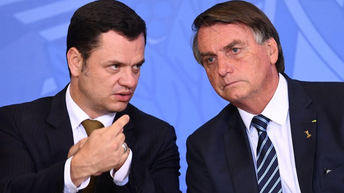 Brazilian President Jair Bolsonaro (L) and his Minister of Justice Anderson Torres.