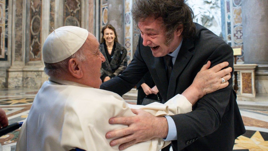 This handout photograph taken on February 11, 2024, and released by the Vatican press office, Vatican Media, shows Pope Francis greeting President Javier Milei at the Vatican.