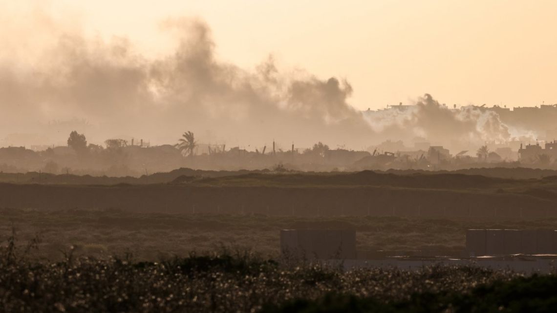 This picture taken from a position in southern Israel near the border with the Gaza Strip shows smoke billowing in Gaza following Israeli bombardment on March 4, 2024, amid continuing battles between Israel and the Palestinian militant group Hamas.