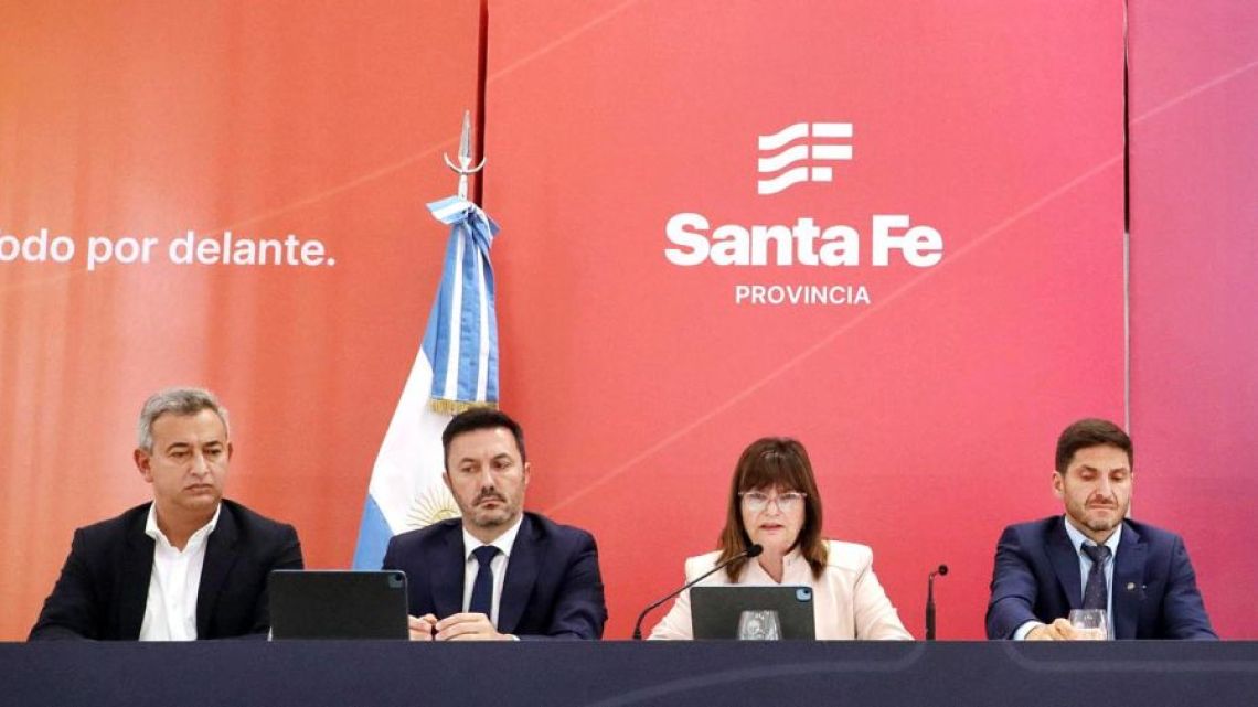 Defence Minister Luis Petri appears at a press conference in Rosario with Security Minister Patricia Bullrich, Santa Fe Province Governor Maximiliano Pullaro and other officials.