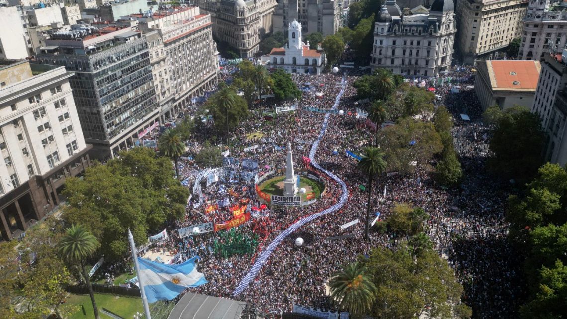 Human rights demonstrators flock to the Plaza de Mayo to commemorate the 48th anniversary of the coup that brought the 1976-1983 military dictatorship to power, in Buenos Aires on March 24, 2024. 