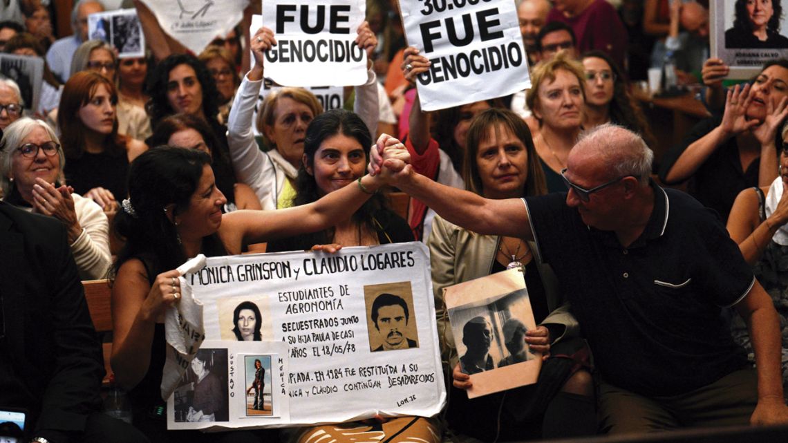 Los Pozos TrialVictoria Moyano Artigas (left) and Pablo Diaz (right), survivors of the 1976-1983 military dictatorship, celebrate the reading of sentences as a court in La Plata delivers verdict in the collective trial known as the ‘Los Pozos Trial,’ at Federal Oral Court No. 1 in La Plata, Buenos Aires Province, Argentina, on March 26, 2024.