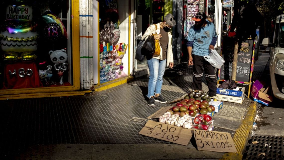 A street vendor sells fruits and vegetables in the Balvanera neighbourhood of Buenos Aires, Argentina.