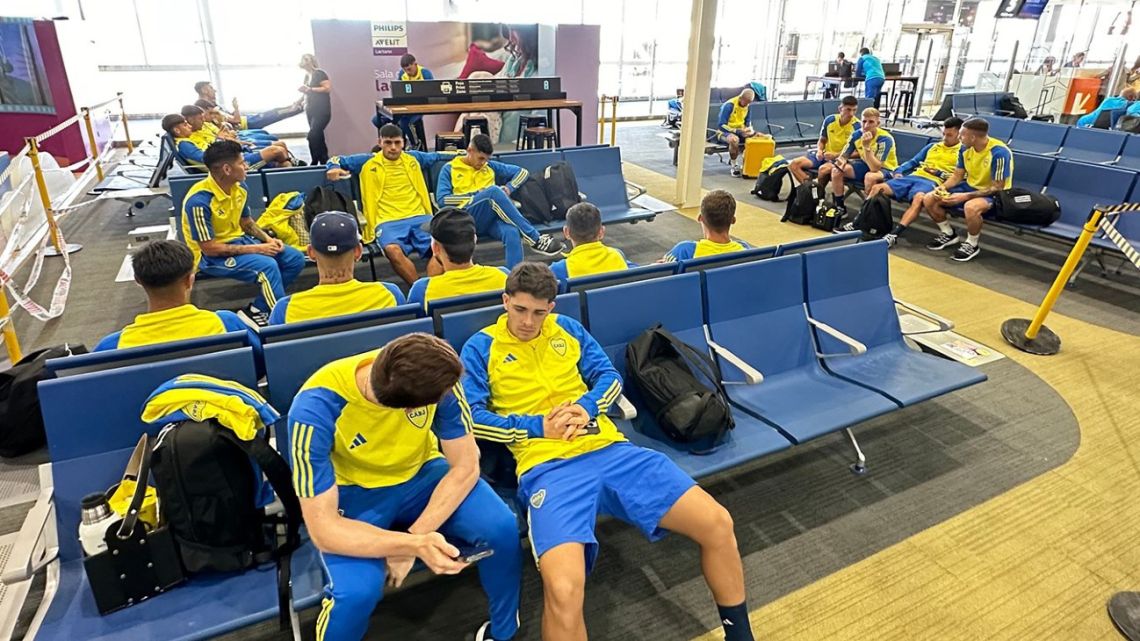 Boca Juniors players wait to board a plane to Bolivia for their Copa Sudamericana clash against Nacional Potosí. 