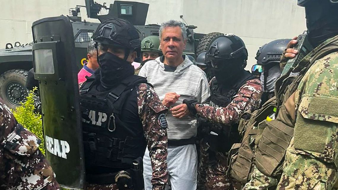 This handout picture released by the Ecuadorean Police shows former Ecuadorean vice-president Jorge Glas being escorted by members of the Special Penitentiary Action Group (GEAP) during his arrival at the maximum security prison La Roca in Guayaquil on April 6, 2024. 