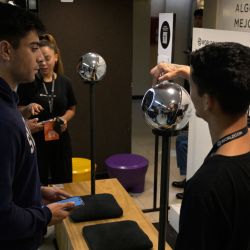 A man has his iris scanned with an orb, a biometric data scanning device, in exchange for the Worldcoin cryptocurrency in Buenos Aires on March 22, 2024. 