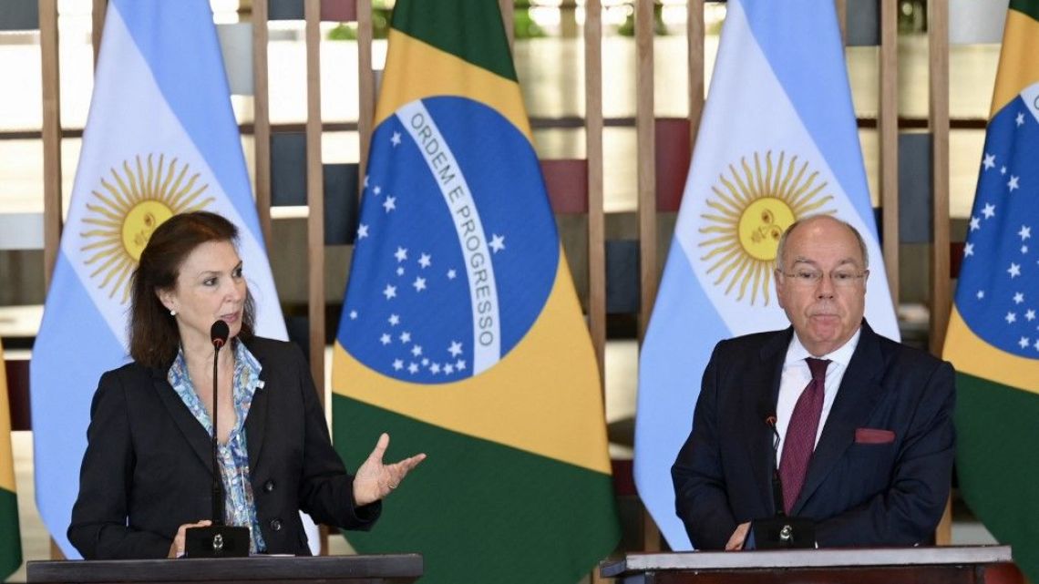 Argentina's Foreign Minister Diana Mondino makes a statement beside her Brazilian counterpart Mauro Vieira at the Itamaraty Palace in Brasilia on April 15, 2024. 