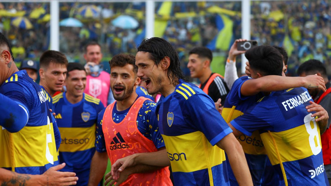 Boca Juniors' Uruguayan forward Edinson Cavani celebrates with teammates after winning during the Argentine Professional Football League Cup quarter-final match between River Plate and Boca Juniors at the Mario Alberto Kempes Stadium in Cordoba, Argentina, on April 21, 2024.
