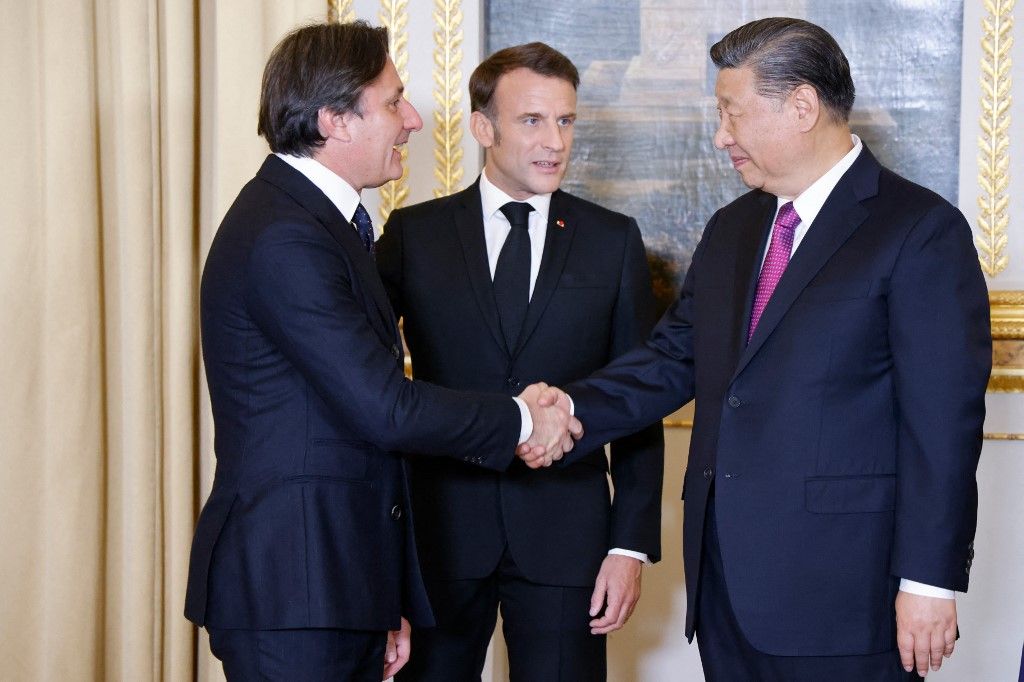 Axel Dumas, CEO de Hermès. con Macron y Xi Jinping.