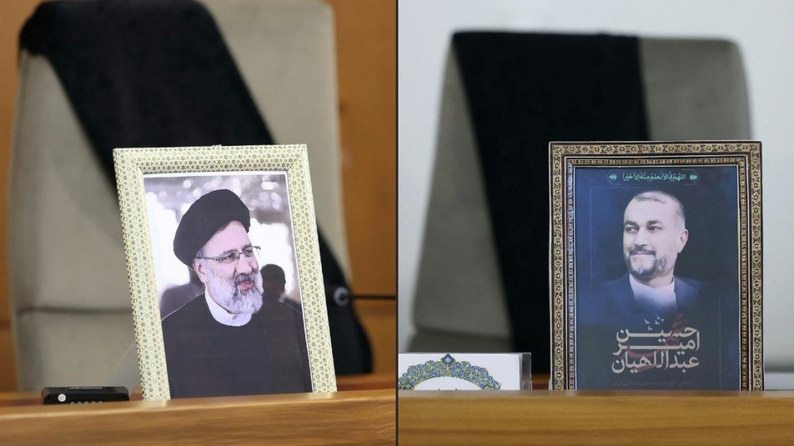 Handout photos released by the Iranian Presidency on May 20, 2024 of the empty seats of Iran's late president Ebrahim Raisi and foreign minister Hossein Amir-Abdollahian during a cabinet meeting held in Tehran the same day, following a plane crash in which they were both killed the previous day. 