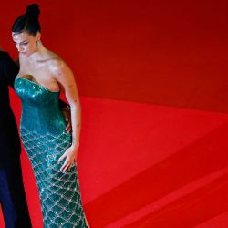 La modelo y actriz argentina Oriana Sabatini y su compañero, el delantero argentino Paulo Dybala, llegan a la proyección de la película "The Shrouds" en la 77ª edición del Festival de Cine de Cannes en Cannes, sur de Francia. | Foto:SAMEER Al-DOUMY / AFP