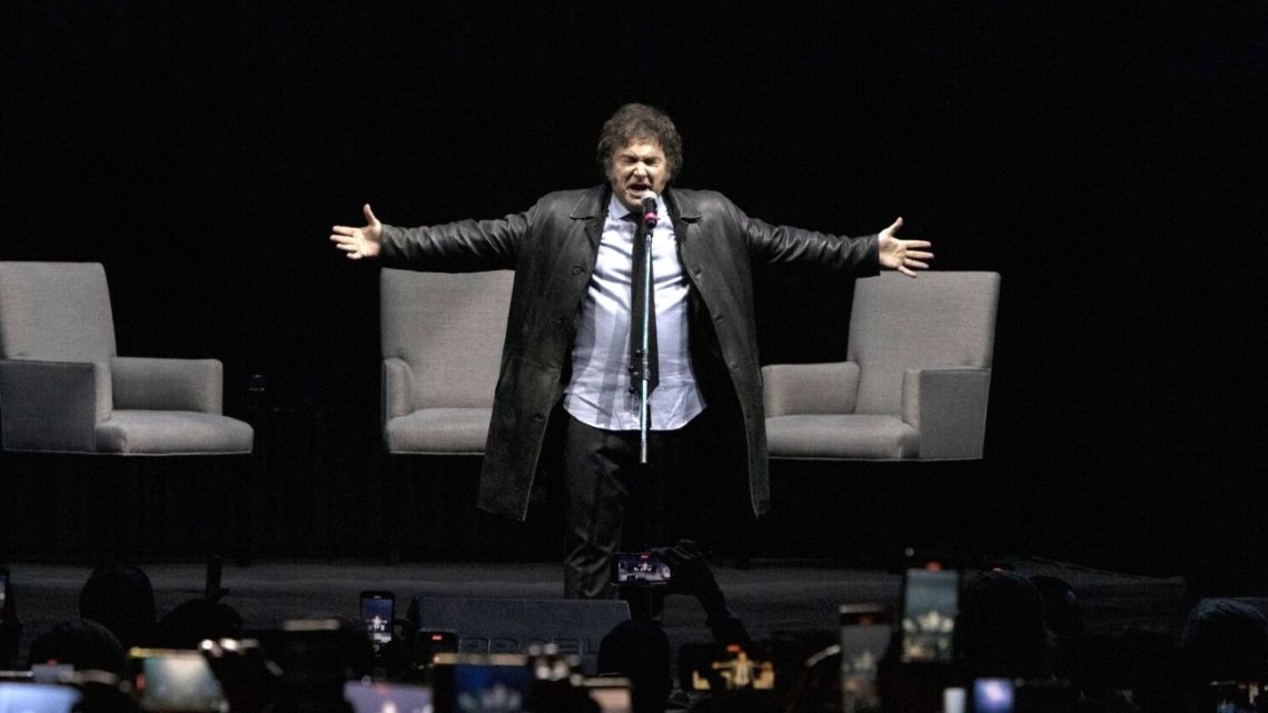 President Javier Milei speaks during a book launch at a Buenos Aires arena on Wednesday.