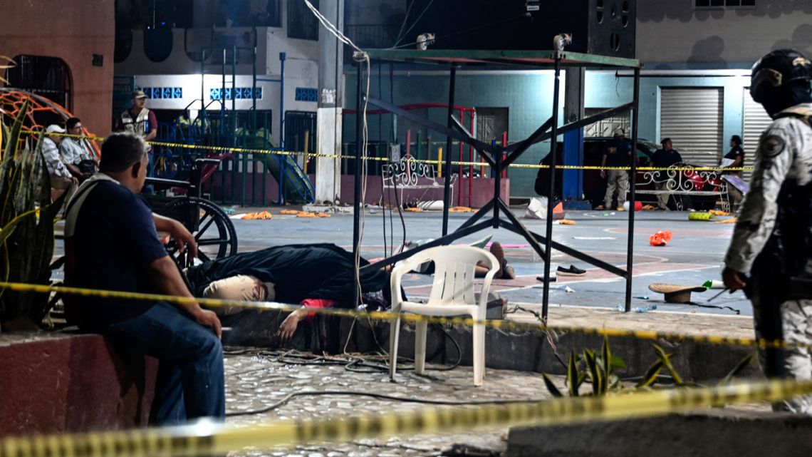 A member of the National Guard custodies the crime scene of the mayoral candidate of the opposition, Alfredo Cabrera, murdered during his electoral campaign closure in Las Lomas, Guerrero, Mexico on May 29, 2024. Cabrera was shot dead in southern Mexico May 29 during a campaign rally, the Guerrero state governor said, the latest in a string of attacks ahead of weekend elections. 