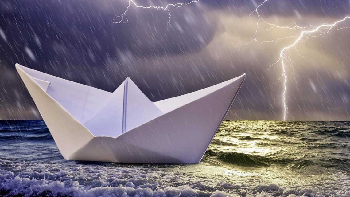 Fragile ship on stormy seas.