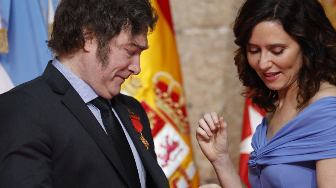 Argentina's President Javier Milei is awarded the Juan de Mariana Institute's medal by President of the Madrid Region Isabel Díaz Ayuso in Madrid on June 21, 2024. 