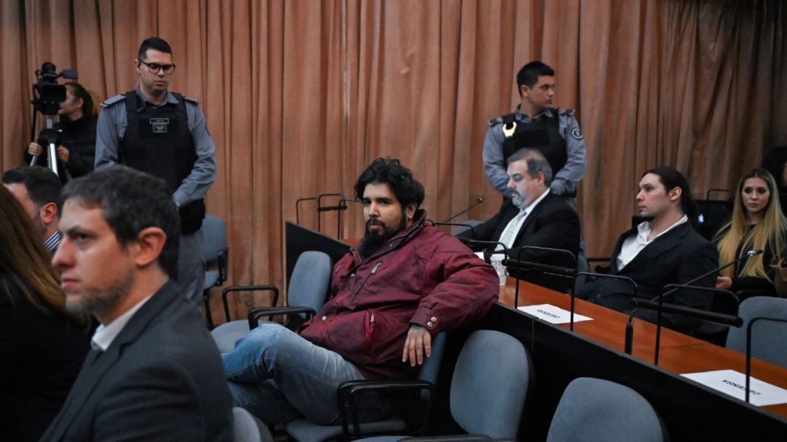 Fernando Sabag Montiel and Nicolás Carrizo, two of the defendants in the trial into the attempted murder of Cristina Fernández de Kirchner, are pictured in court at the Comodoro Py courthouse in Buenos Aires on June 26, 2024.