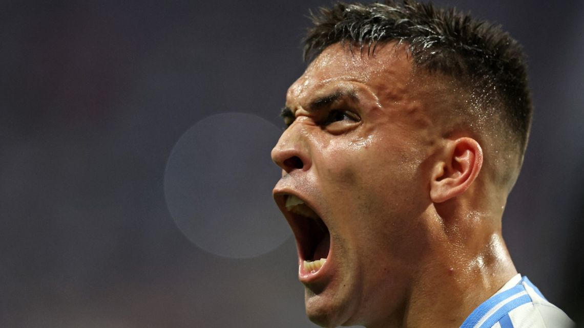 Argentina's forward #22 Lautaro Martínez celebrates scoring his team's second goal during the Conmebol 2024 Copa America tournament group A football match between Argentina and Canada at Mercedes Benz Stadium in Atlanta, Georgia, on June 20, 2024. 