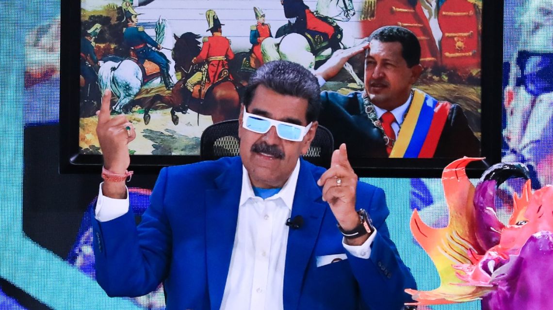 This handout picture released by the Venezuelan Presidency shows Nicolás Maduro gesturing during a television programme in Caracas on July 1, 2024. 
