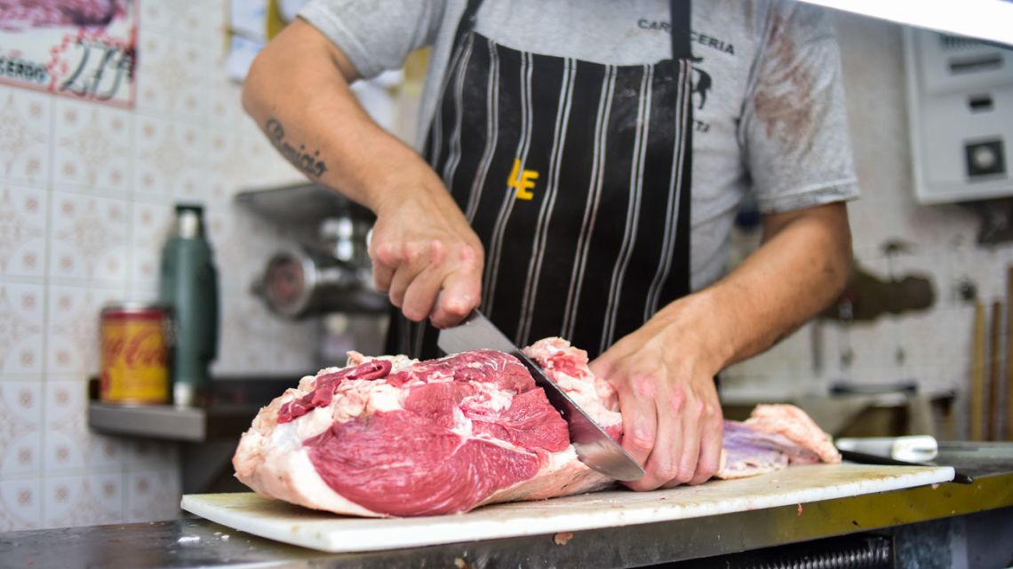 A butcher cuts beef in Buenos Aires, Argentina.