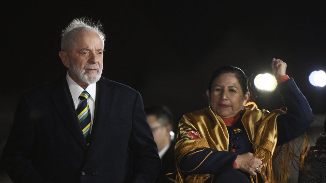 Brazilian President Luiz Inácio Lula da Silva is welcomed by by Bolivia's Foreign Minister Celinda Sosa after his arrival to Viru Viru international airport in Santa Cruz, Bolivia on July 8, 2024. 